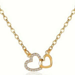 Double Heart Gold Necklace with Sparkling Accents


New